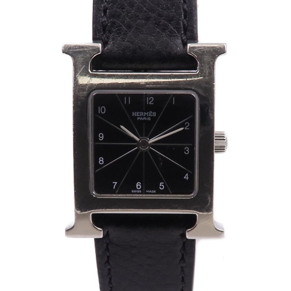 Hermes H Watch HH1.210 Quartz Watch: Black quartz H Watch in stainless steel with leather belt. 30 x 21mm case, fits 13.5-16cm wrist.