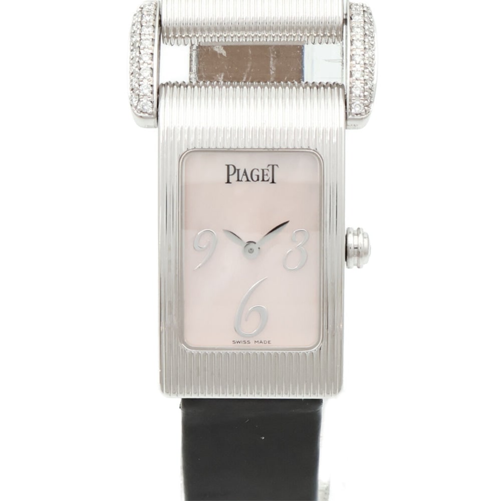 Piaget Miss Protocole 5322 Quartz MOP: Quartz Miss Protocole 5322/2003 in 18K white gold with MOP. Case 30x17mm, wrist 15.5cm, band 13mm. Includes guarantee.
