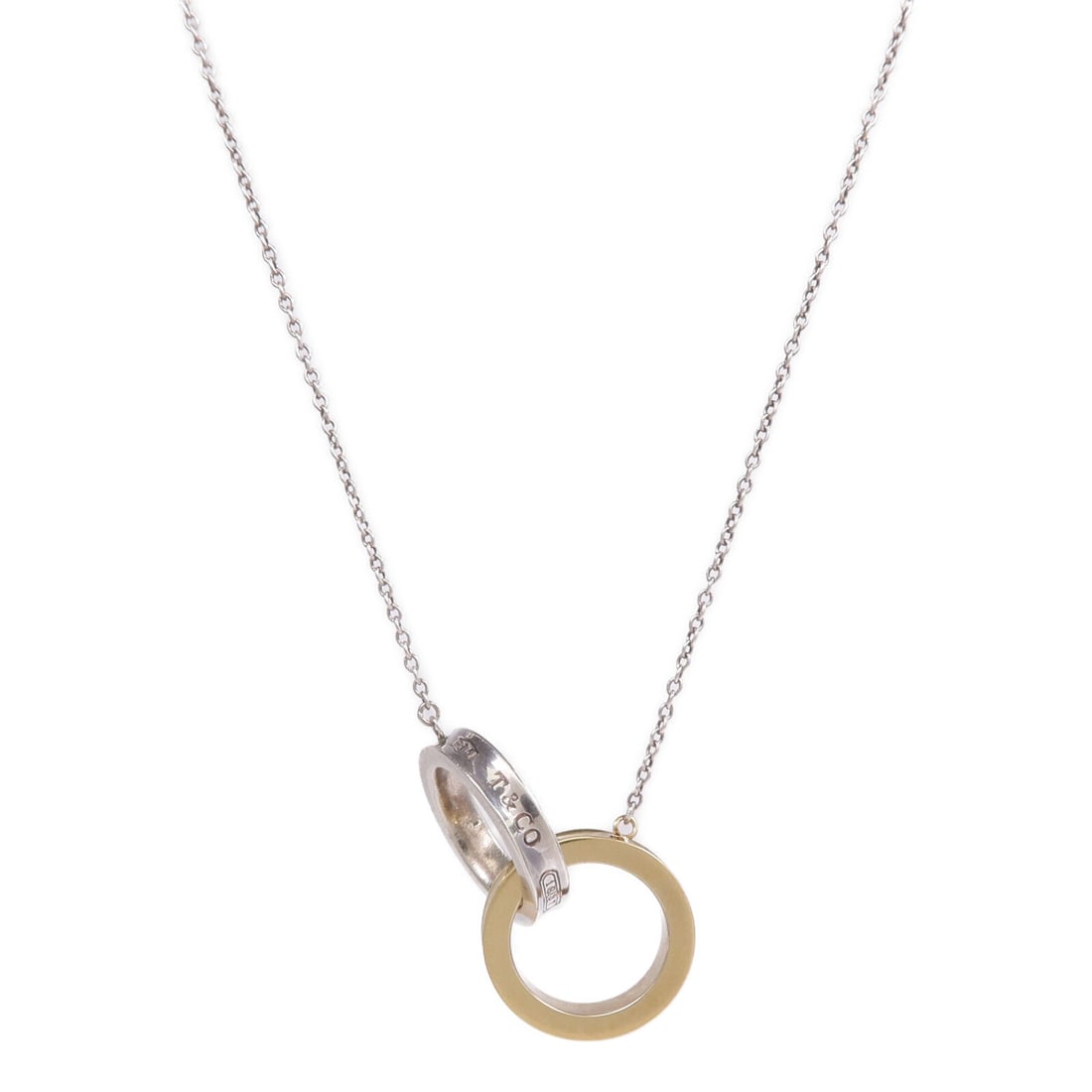 Tiffany 1837 Circles Necklace: 1837 Interlocking Circles necklace in 18K gold and 925 sterling silver.