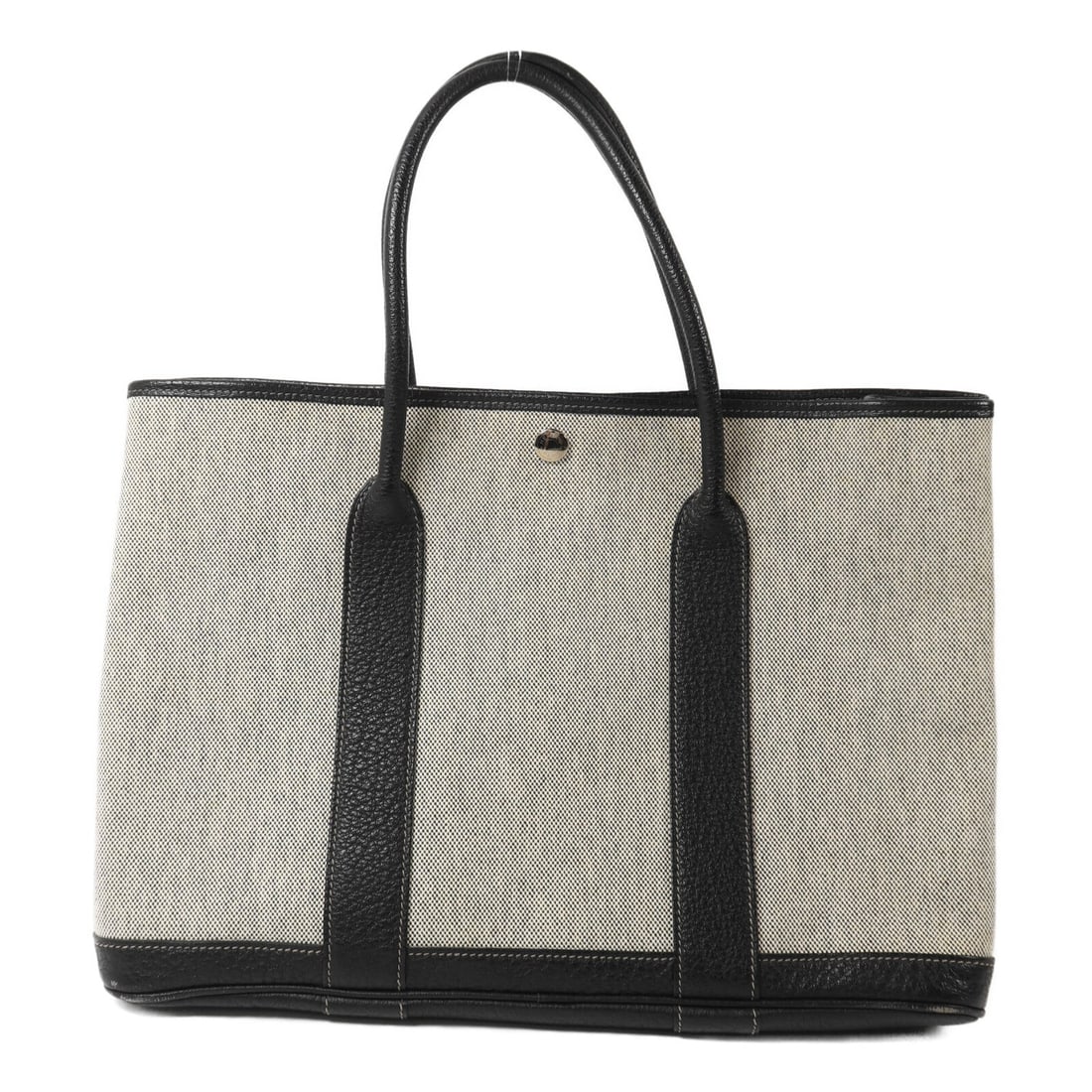 Hermes Garden Party PM: Black and white canvas handbag.