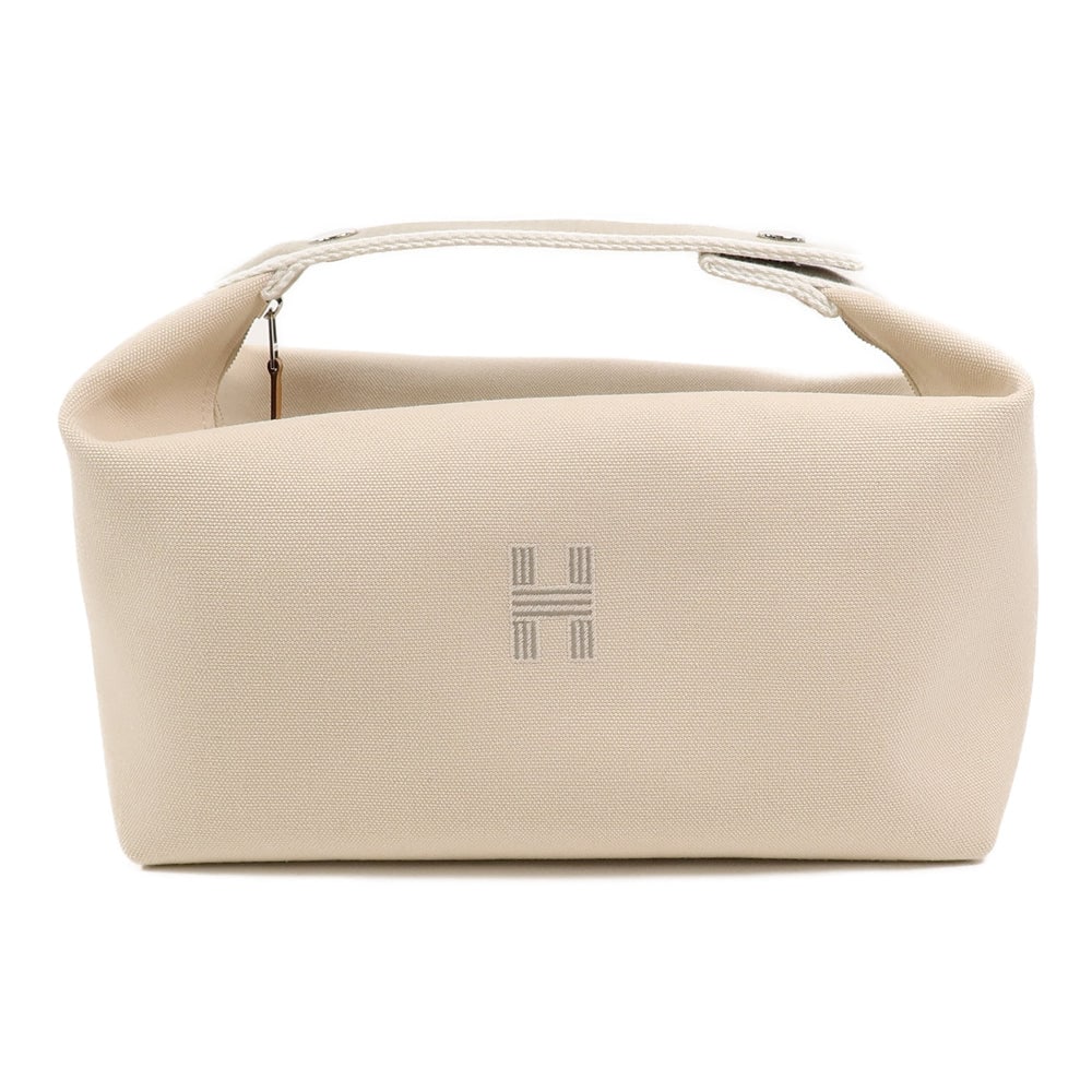 Hermes Bride a Brac GM Naturel: Bride a Brac GM handbag in naturel Towar canvas with palladium-tone hardware. Size 25 x 13 x 15 cm.