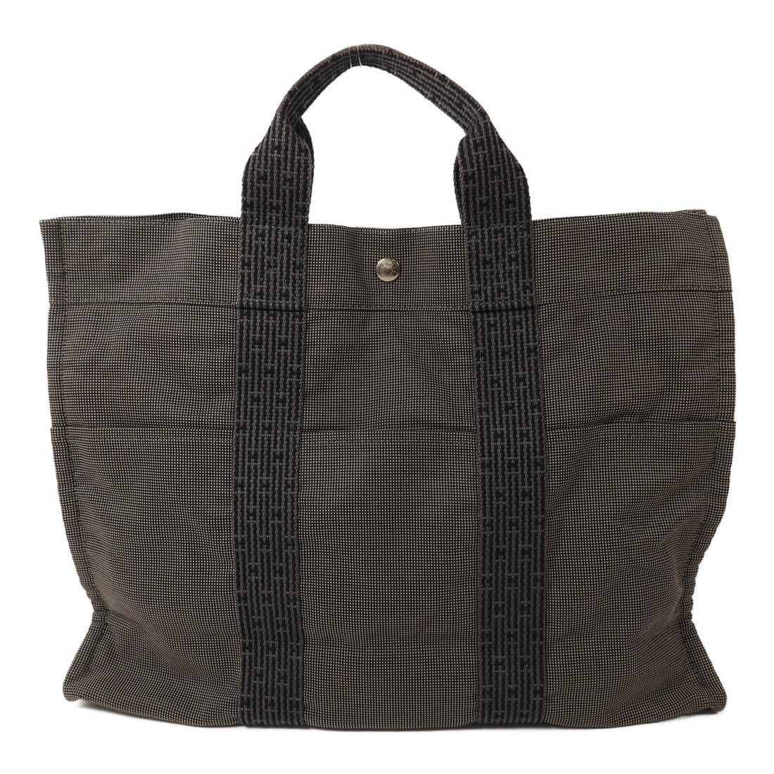 Hermes Herline MM Tote Gray: Herline MM tote in gray canvas with palladium-tone hardware. Size 42 x 32 x 11 cm. Handle 28 cm.