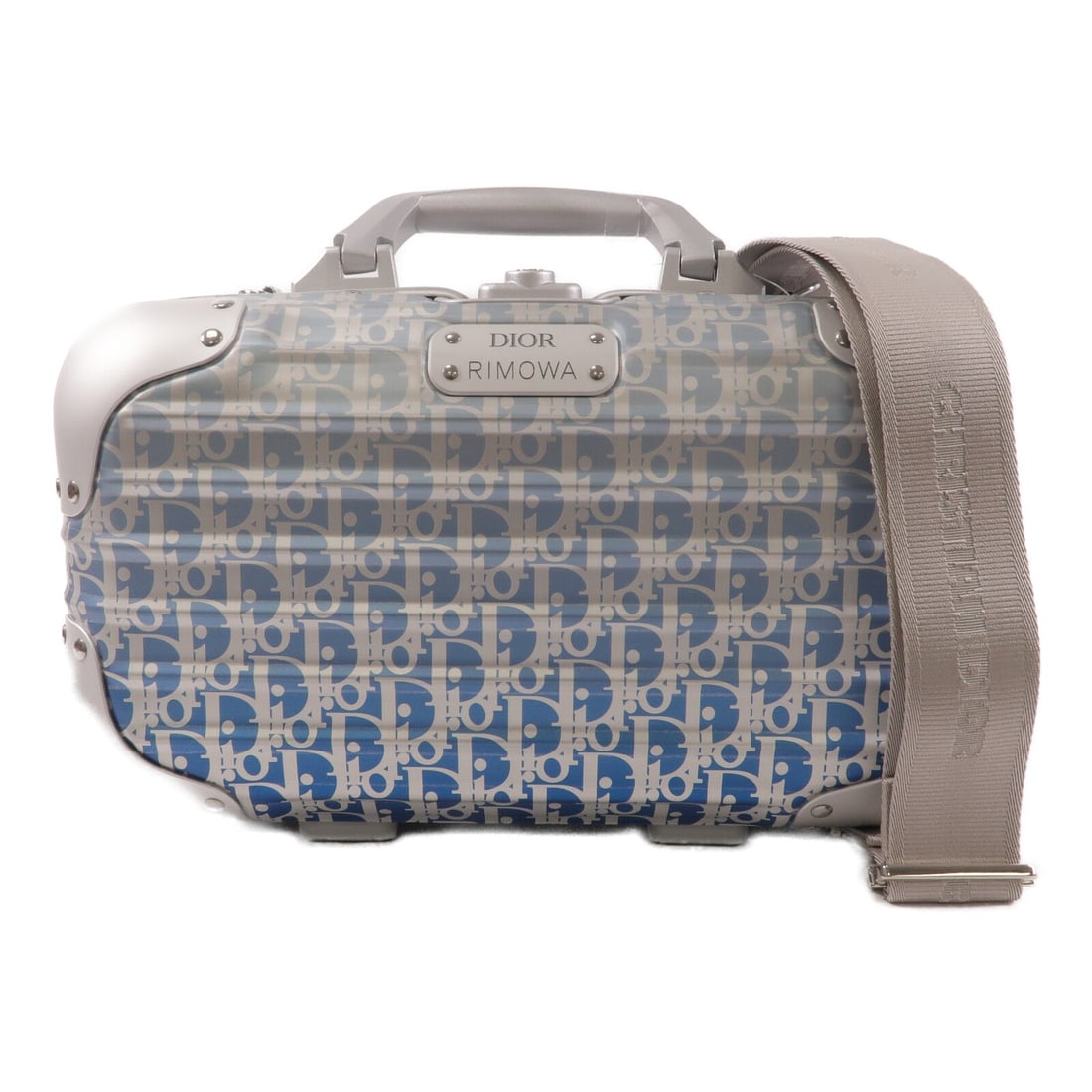 Dior Rimowa x Dior Trunk Silver: Silver aluminum hand case trunk with Oblique design.