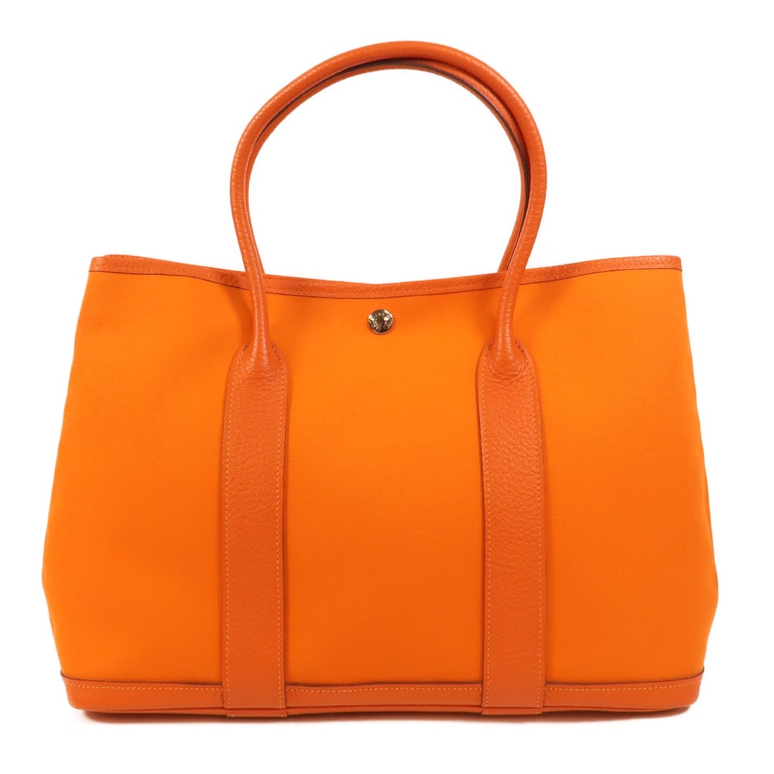 Hermes Garden Party PM: Feu canvas handbag.