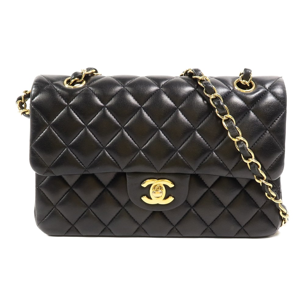 Chanel Classic 23 Black: Black lambskin Classic 23 chain shoulder bag with gold-tone hardware.