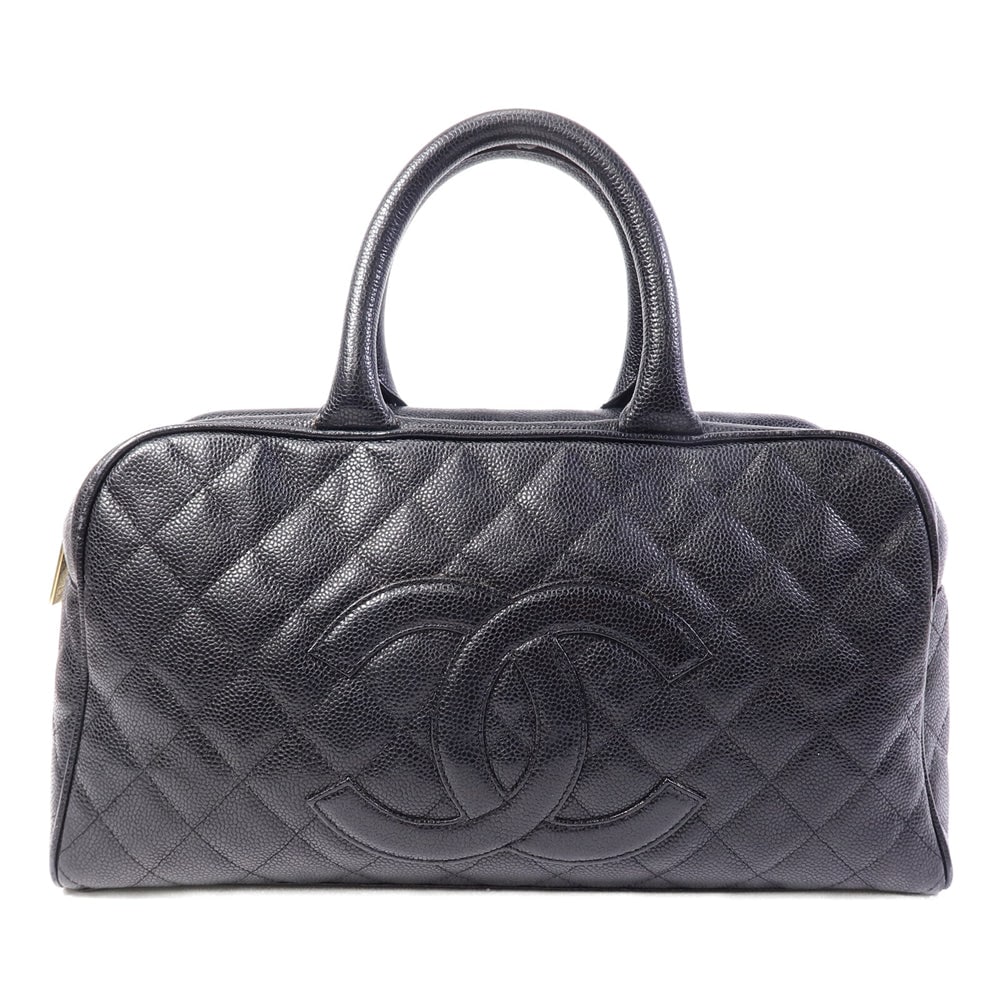 Chanel Vintage Handbag Black: Vintage handbag in black calfskin with gold hardware. Includes hologram sticker. Size 37 x 20 x 10.5 cm.