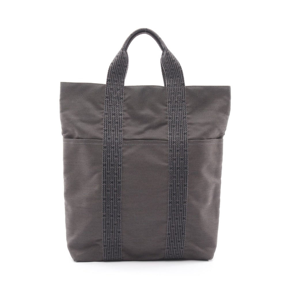 Hermes Herline Kabas Tote Dark Gray: Herline Kabas tote in dark gray nylon canvas with silver-tone hardware. Size 30 x 40 x 7 cm. Handle 29 cm.
