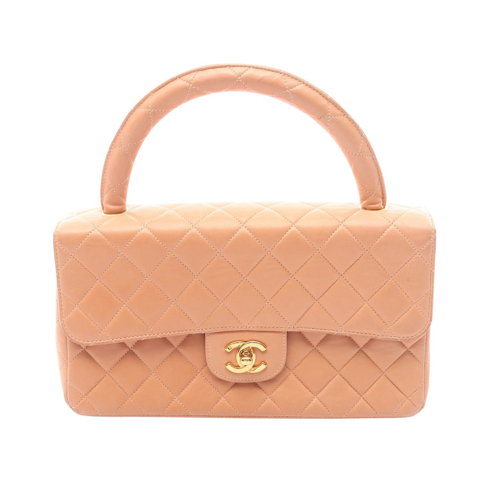 Chanel Parent Child Handbag: Coral orange lambskin handbag.