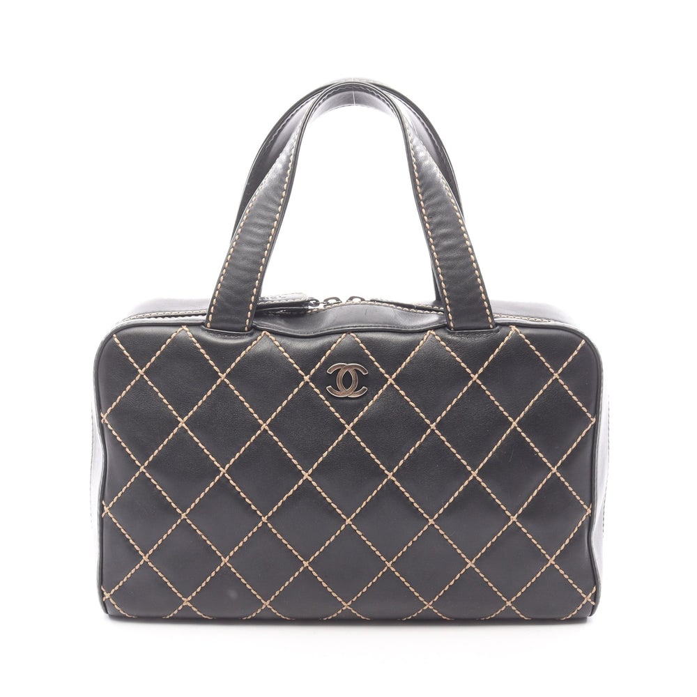 Chanel Wild Stitch Handbag: Black leather handbag with gold hardware.