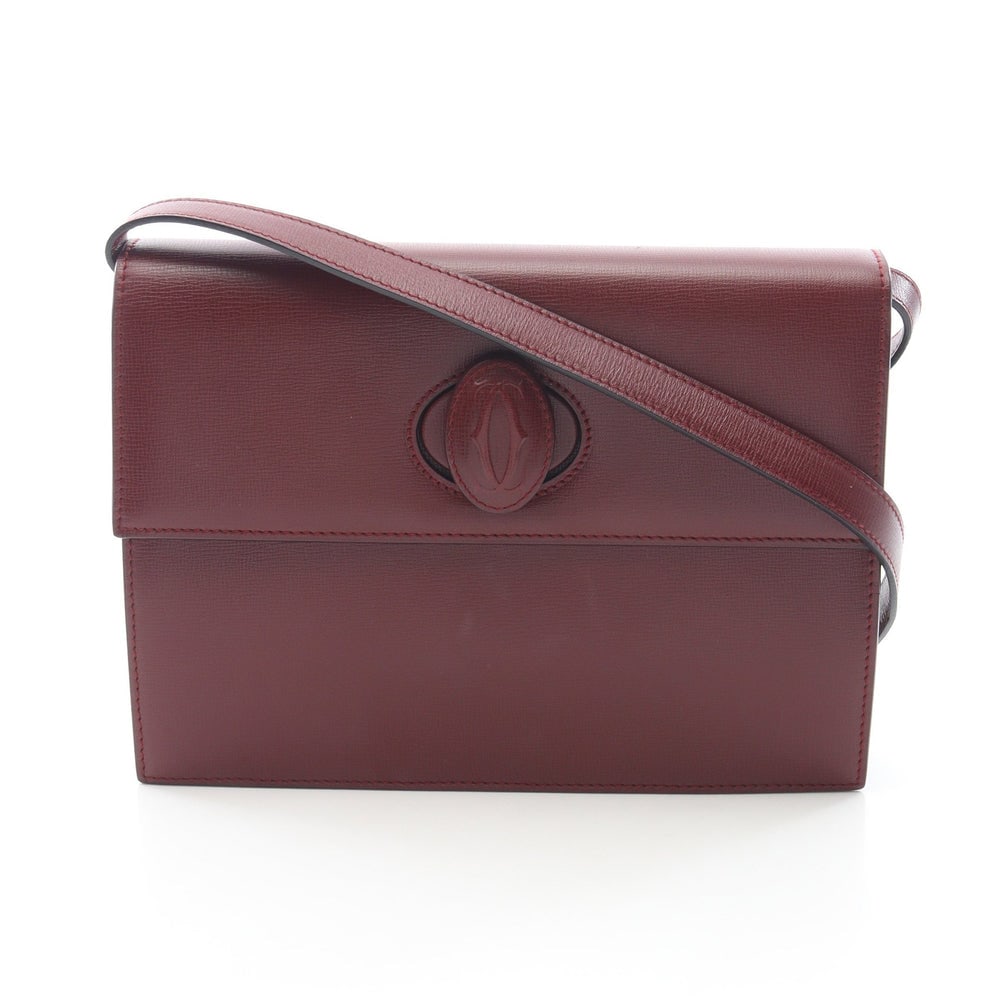 Cartier Must Line Shoulder Bordeaux: Must line shoulder bag in bordeaux leather. Size 25 x 18.5 x 4 cm. Strap 95 to 100 cm.