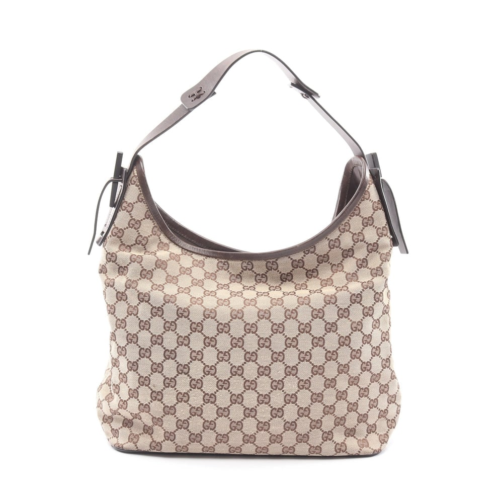 Gucci GG Canvas One Shoulder Beige: GG canvas one shoulder bag in beige and dark brown. Size 32 x 27 x 11 cm.