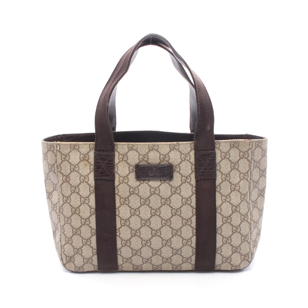 Gucci GG Supreme Tote 141976 Beige: GG Supreme tote 141976 in beige and dark brown PVC and leather. Size 30 x 21 x 9 cm. Handle 39.5 cm.