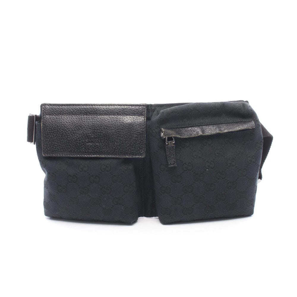 Gucci GG Canvas Waist Bag Black: GG canvas waist bag in black with leather trim. Size 29 x 16 x 2.5 cm. Strap 53 to 88 cm.