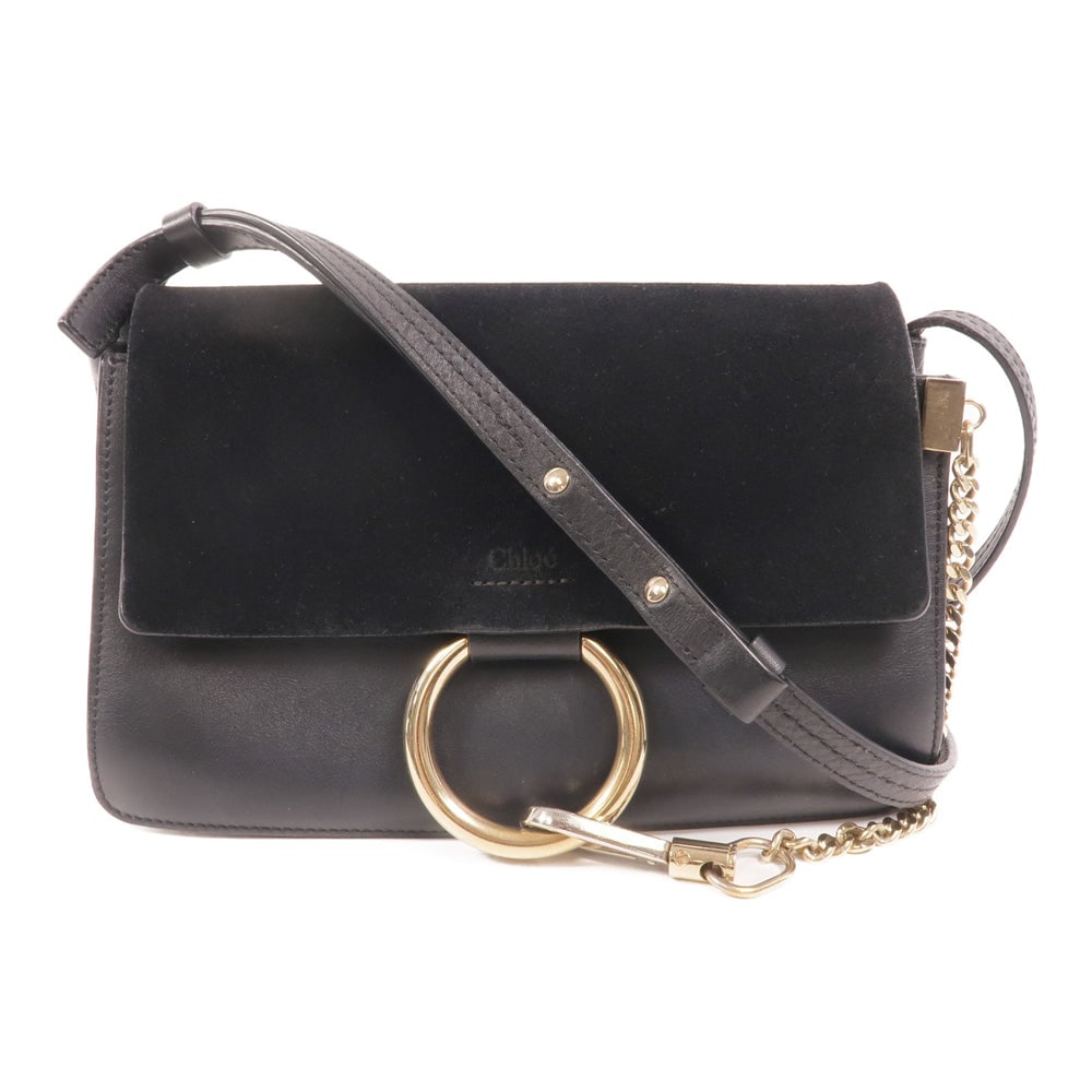 Chloe Faye Shoulder Bag Black: Faye shoulder bag in black calfskin and suede. Size 24 x 13.5 x 4 cm. Strap 106 to 118 cm.