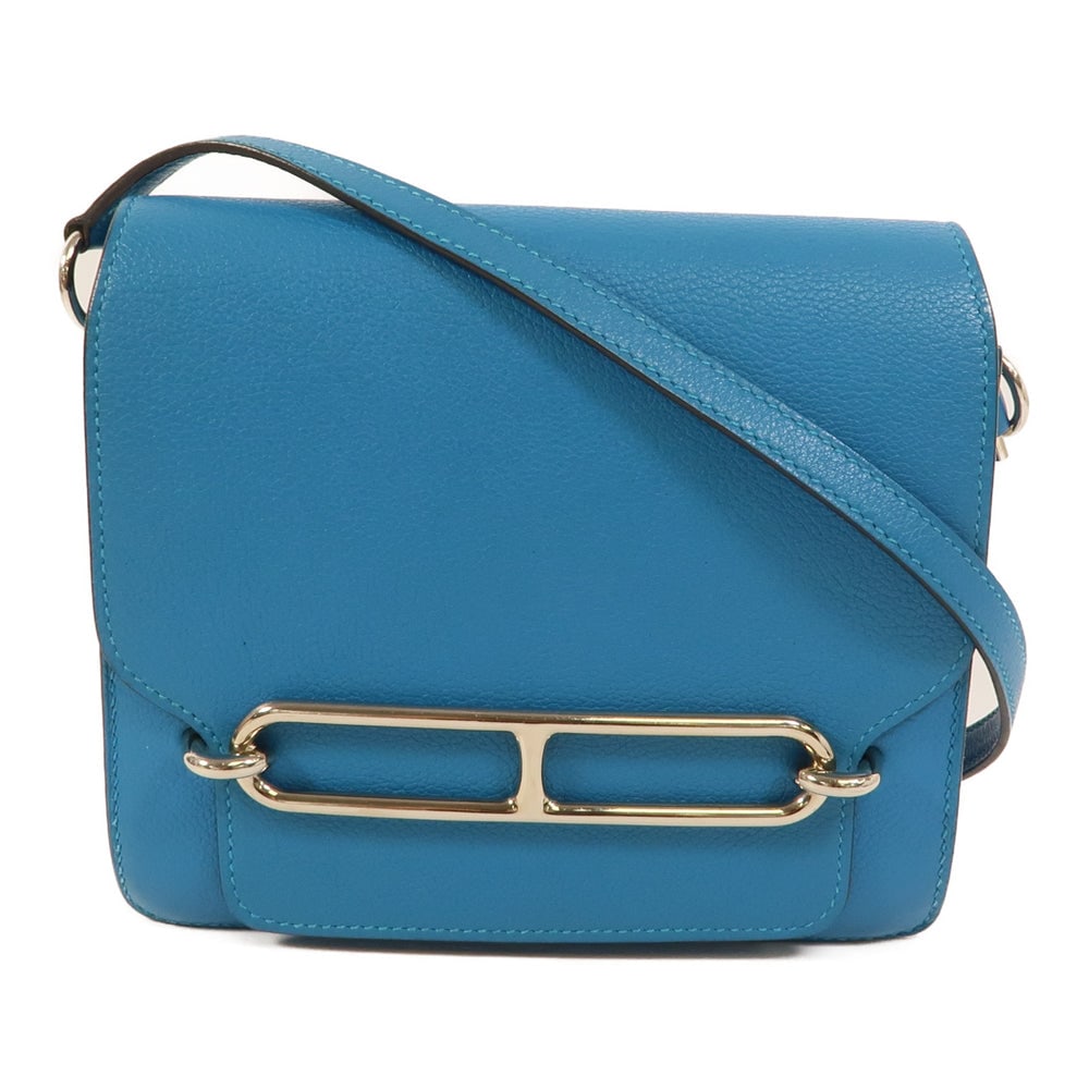Hermes Roulis Mini Bleu Zanzibar: Bleu Zanzibar Evercolor leather shoulder bag with palladium-tone hardware.