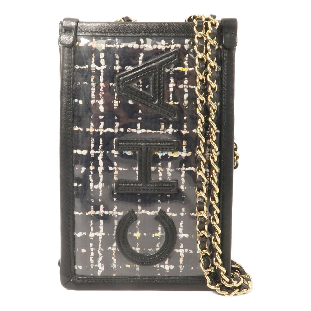 Chanel Clutch With Chain: Black tweed and PVC chain shoulder bag.