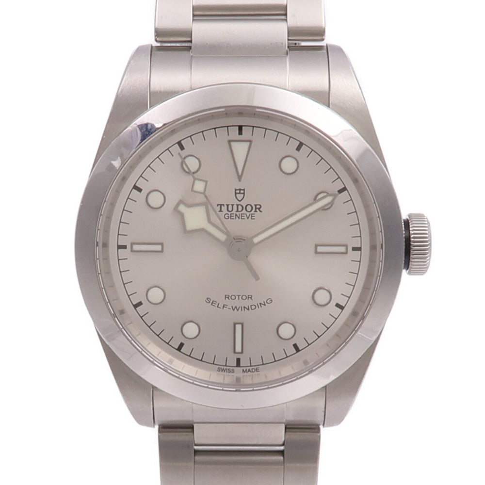Tudor Black Bay 79540 Automatic: White automatic watch in stainless steel. Includes storage box, storage bags, guarantee, and piece. 41mm case, 14.5cm wrist.