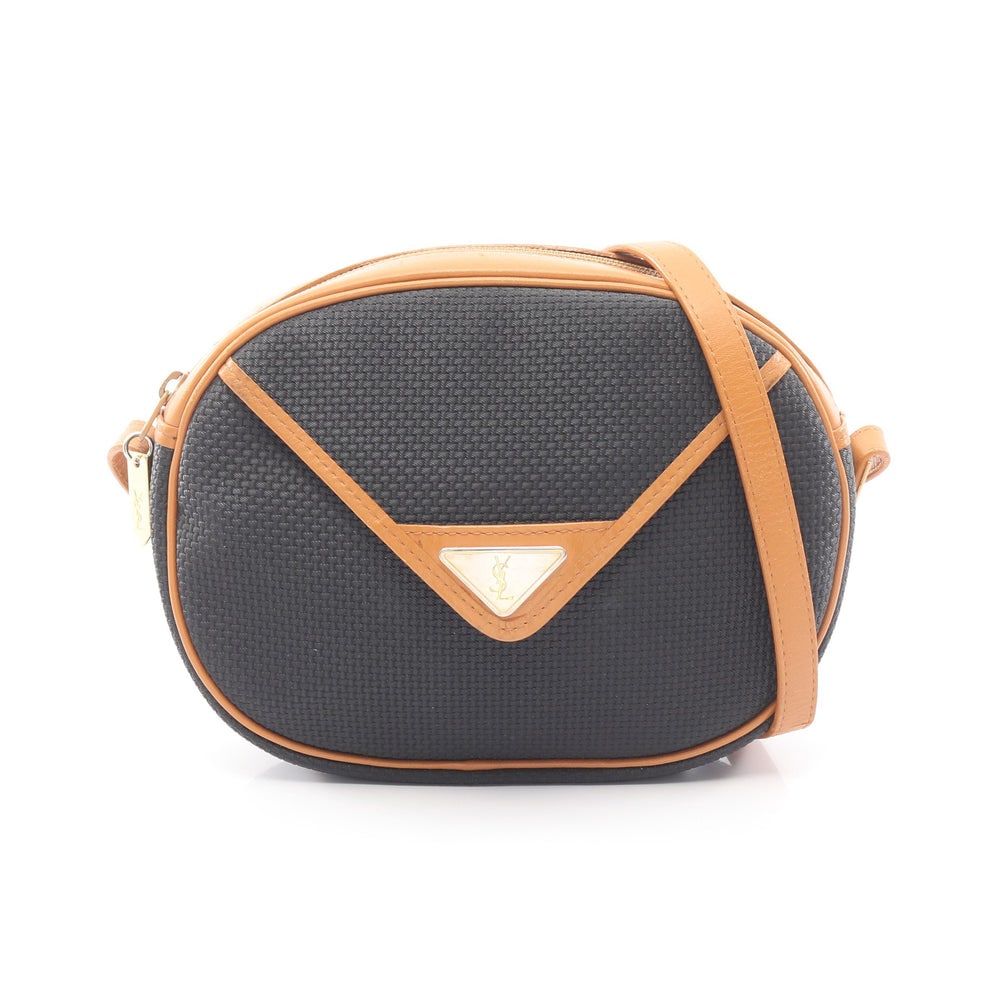 YSL Logo Shoulder Bag Black Brown: Logo shoulder bag in black and light brown PVC and leather. Size 22 x 17 x 5 cm. Strap 107 to 119 cm.