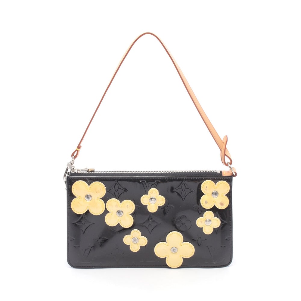 Louis Vuitton Lexington Black Beige: Flower Lexington handbag M92245 in black and beige Monogram Vernis leather. Size 20 x 12 x 4 cm. Handle 42 cm.