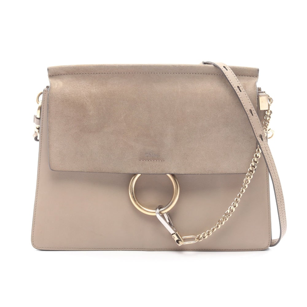 Chloe Faye Shoulder Gray Beige: Faye shoulder bag in gray beige suede and leather. Size 32 x 24 x 1 cm. Strap 85 to 101 cm.