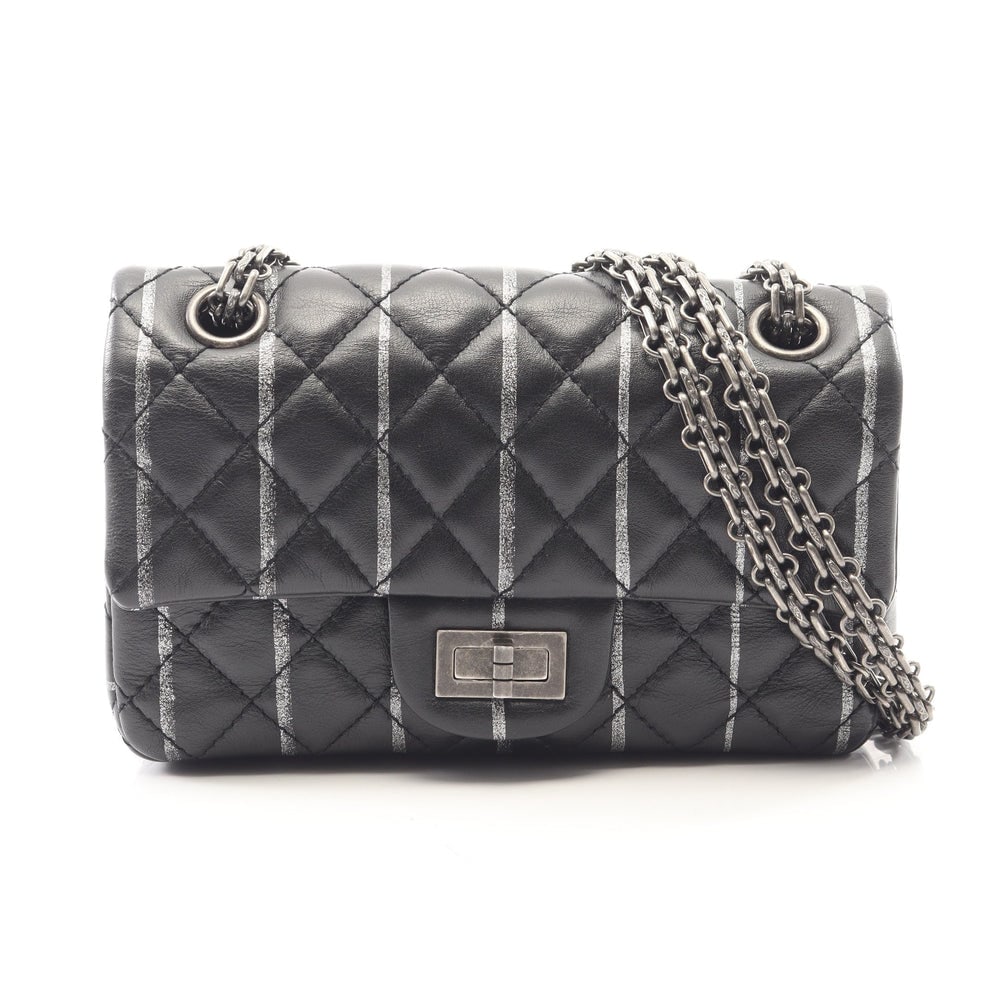 Chanel 2.55 Mini Black: Black lambskin 2.55 mini double chain shoulder bag with silver-tone hardware.