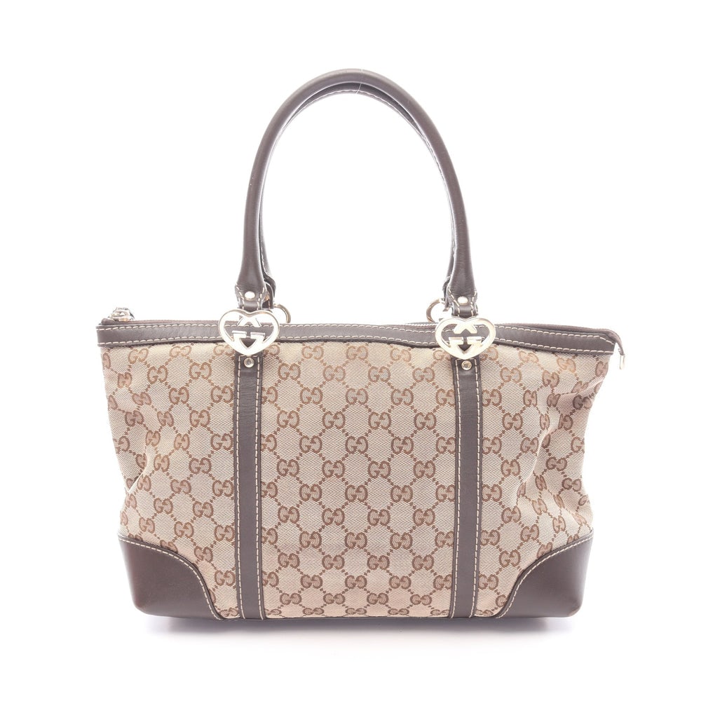 Gucci Lovely GG Canvas Tote Beige: Lovely GG canvas tote in beige and dark brown. Size 31 x 22.5 x 13 cm. Handle 44 cm.