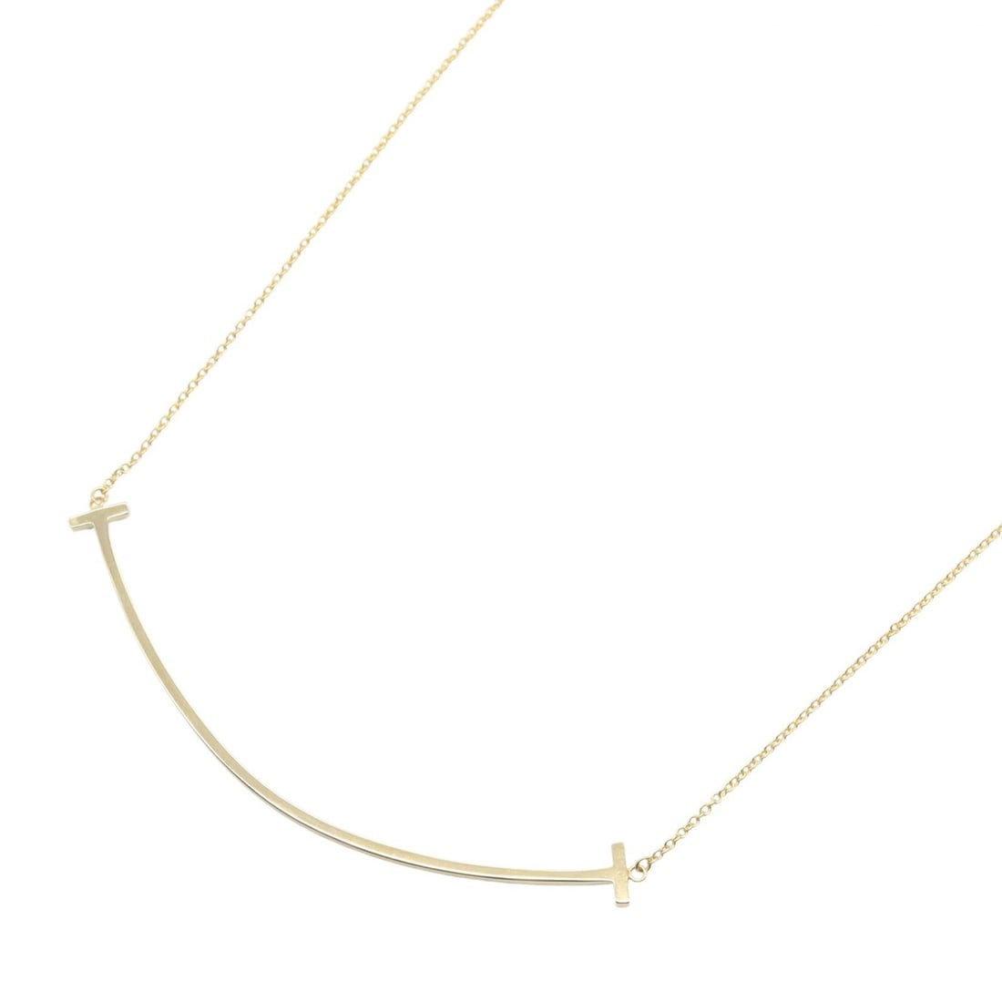 Tiffany T Smile Large Necklace: T Smile Large necklace in K18 yellow gold.