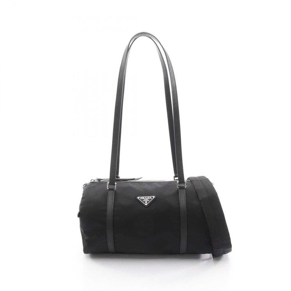 Prada Tessuto Saffiano Duffel: Black nylon and saffiano leather 2 way duffel.