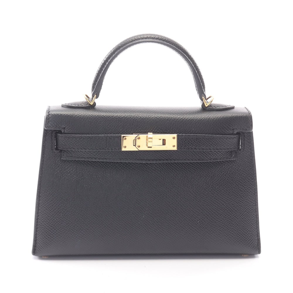 Hermes Mini Kelly 2 Black: Black Veau Epsom outside sewing 2-way mini handbag with gold-tone hardware.