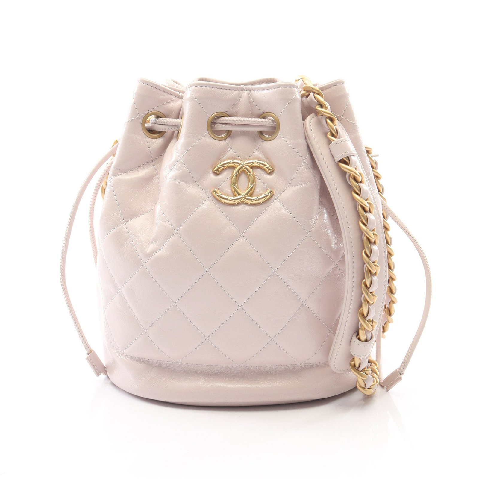 Chanel Bucket Bag Light Pink: Light pink leather bucket bag with chain strap.
