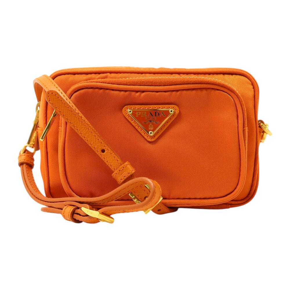 Prada Tessuto Double Bag 1N1862 Orange: Tessuto Double bag 1N1862 in orange nylon with gold-tone hardware. Includes guarantee. Size 15 x 10 x 5 cm. Strap 113 to 126 cm.