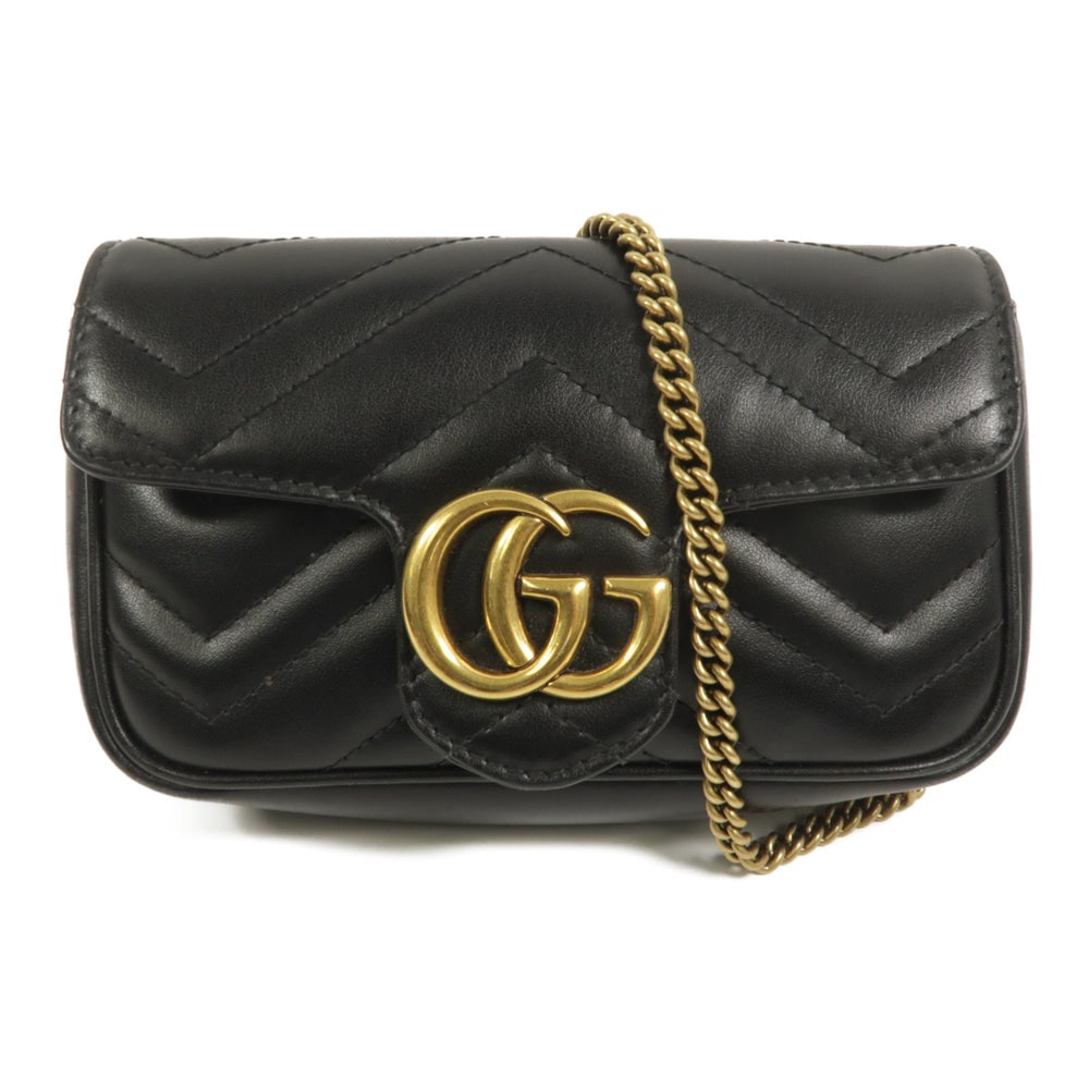 Gucci Marmont Super Mini Black: GG Marmont Super Mini chain shoulder bag 476433 in black calfskin. Includes storage bags. Size 16.5 x 11 x 4 cm.