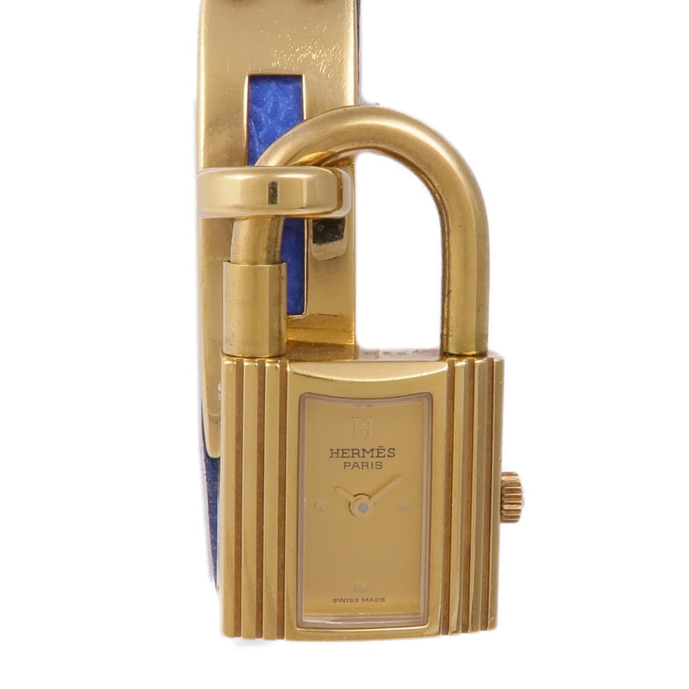 Hermes Kelly Quartz Watch Gold Plated: Gold quartz watch with leather belt and gold plated case. 20 x 20mm case, fits 12.5-15cm wrist.