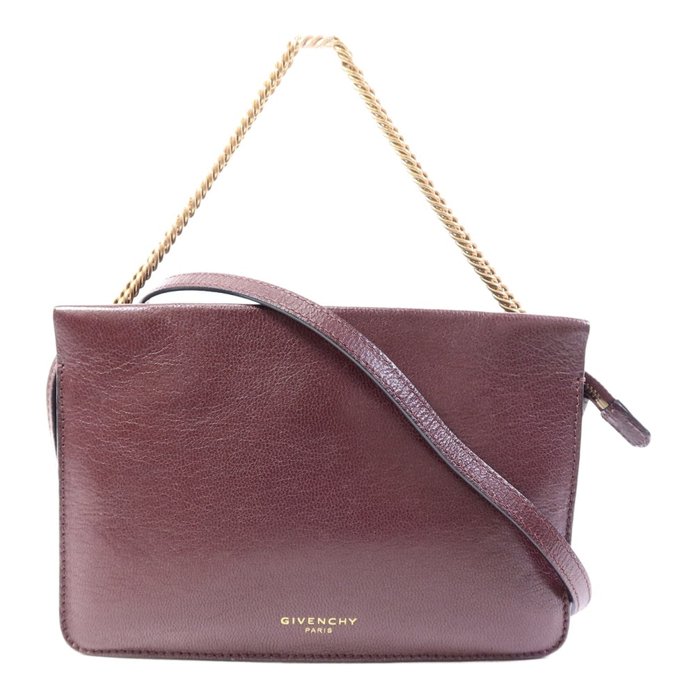 Givenchy 2 Way Chain Shoulder Red: Chain shoulder 2 way bag in red calfskin with gold-tone hardware. Includes storage bags and shoulder strap. Size 21.5 x 14.5 x 3.5 cm.
