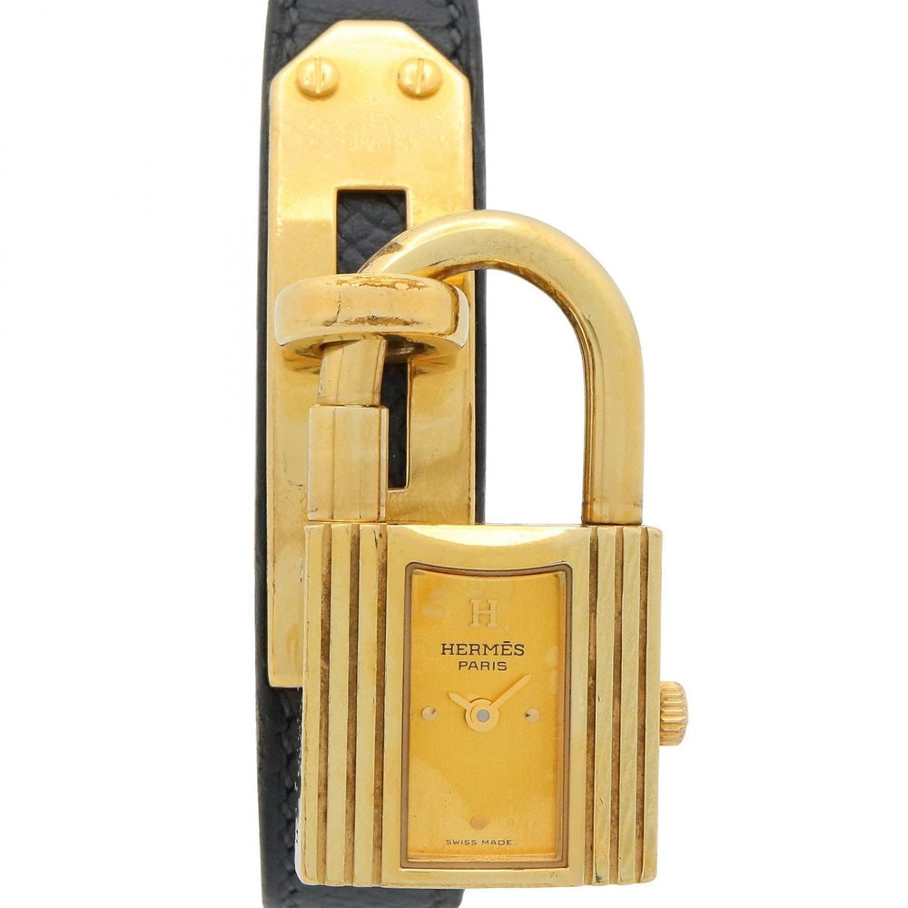 Hermes Kelly Quartz Watch Gold: Gold quartz watch with GP case and leather belt. Model KE1.201. 20mm case, 16cm wrist.
