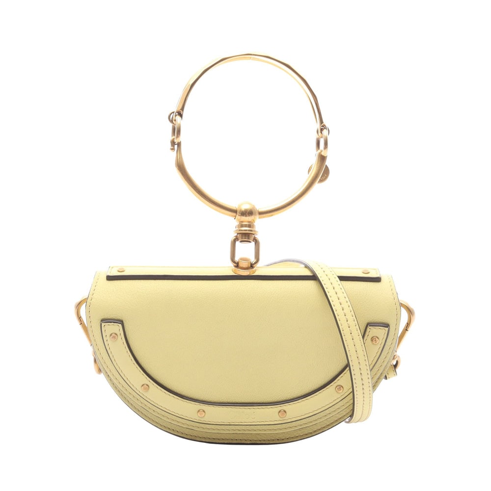 Chloe Nil Small Minaudiere Yellow: Nil Small Minaudiere 2 way handbag in yellow leather. Size 20 x 12 x 6 cm.