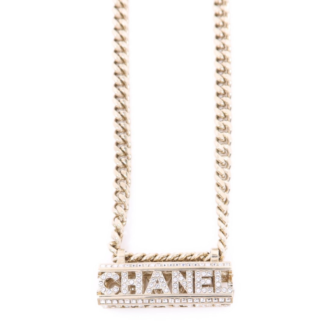 Chanel Crystal Gold Choker: Choker necklace in gold tone metal with crystal.