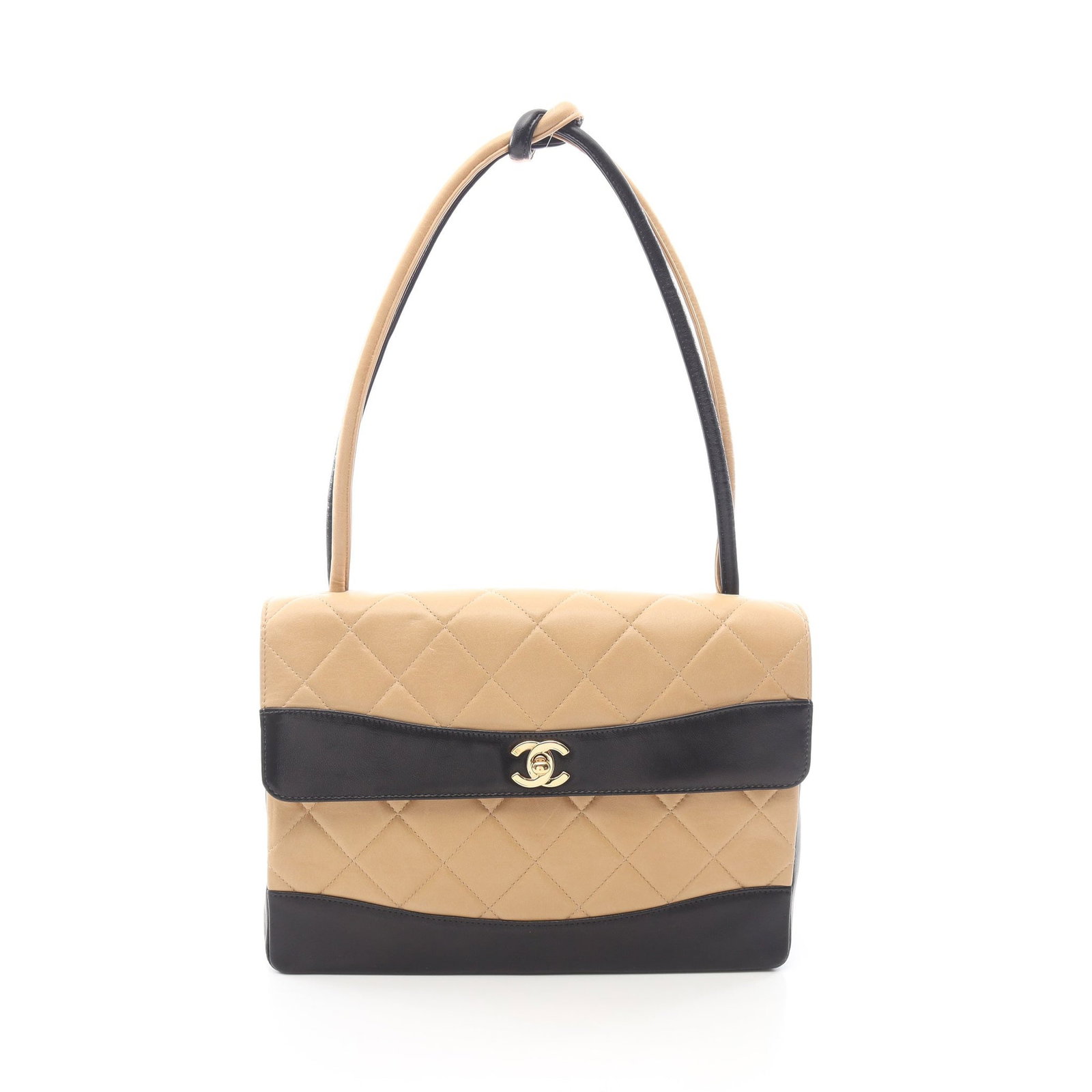 Chanel Bicolor Shoulder Bag Beige: Beige and black Matelasse one shoulder bag in lambskin with gold hardware; includes serial seal and guarantee card; 27 x 20 x 8 cm.