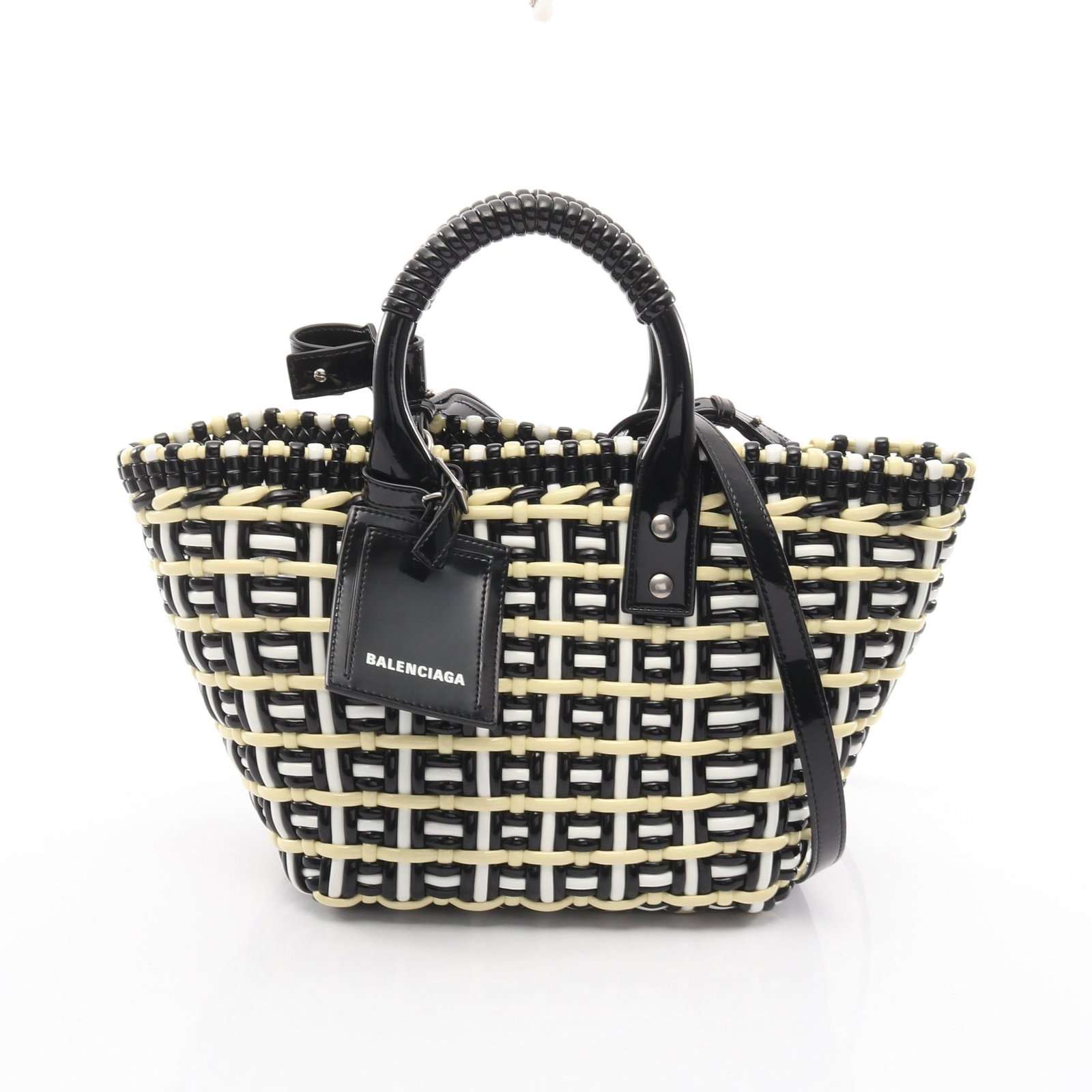 Balenciaga Bistro XS Basket Black: Black and yellow Bistro XS Basket 2 way handbag 671312 in polyester and polyurethane; includes shoulder strap, name tag, and poignet; 21 x 20 x 11.5 cm.