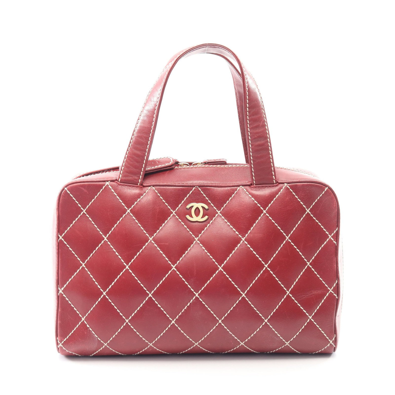 Chanel Wild Stitch Mini Boston: Bordeaux Wild Stitch mini Boston bag in leather with gold hardware; includes guarantee card and serial seal; 33 x 20 x 12 cm.
