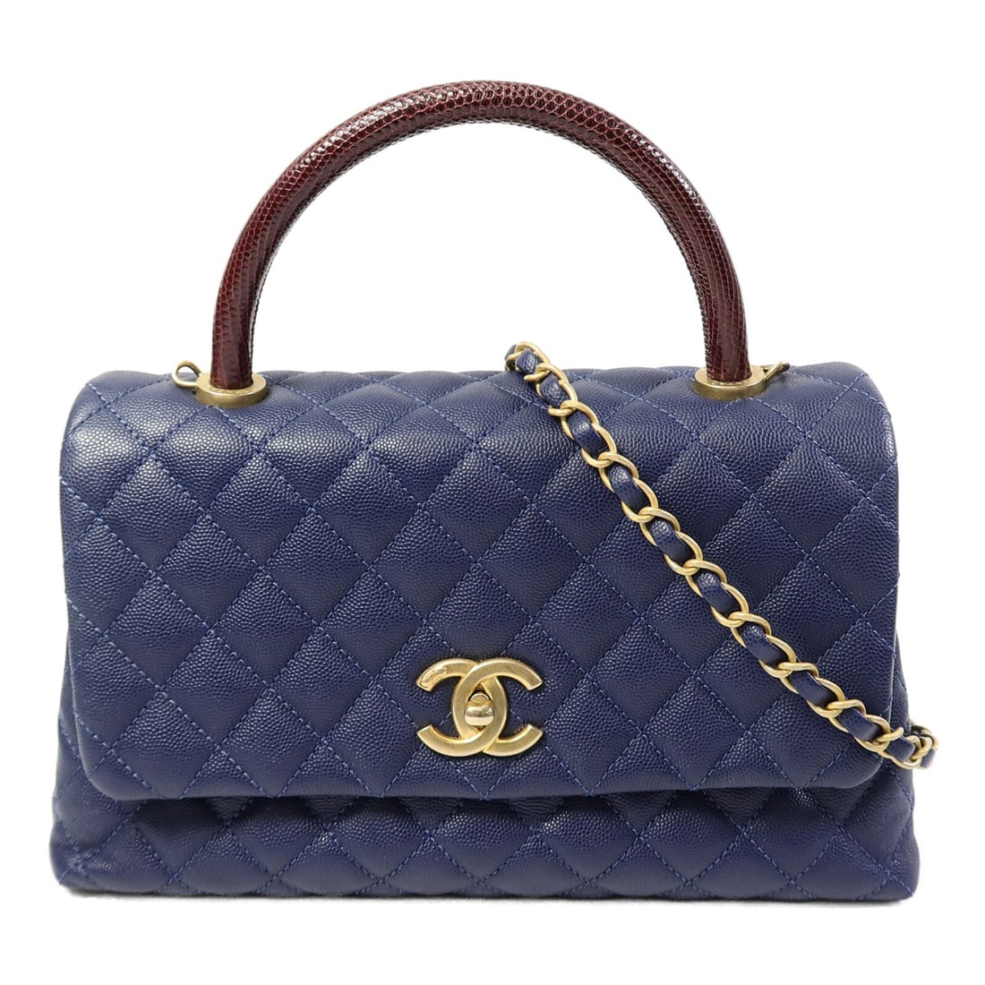 Chanel Coco Handle Blue: Coco Handle shoulder bag A92990 in blue calfskin and lizard leather; includes storage bags, hologram sticker, guarantee, and shoulder strap; 25.5 to 28 x 18 x 11 cm.