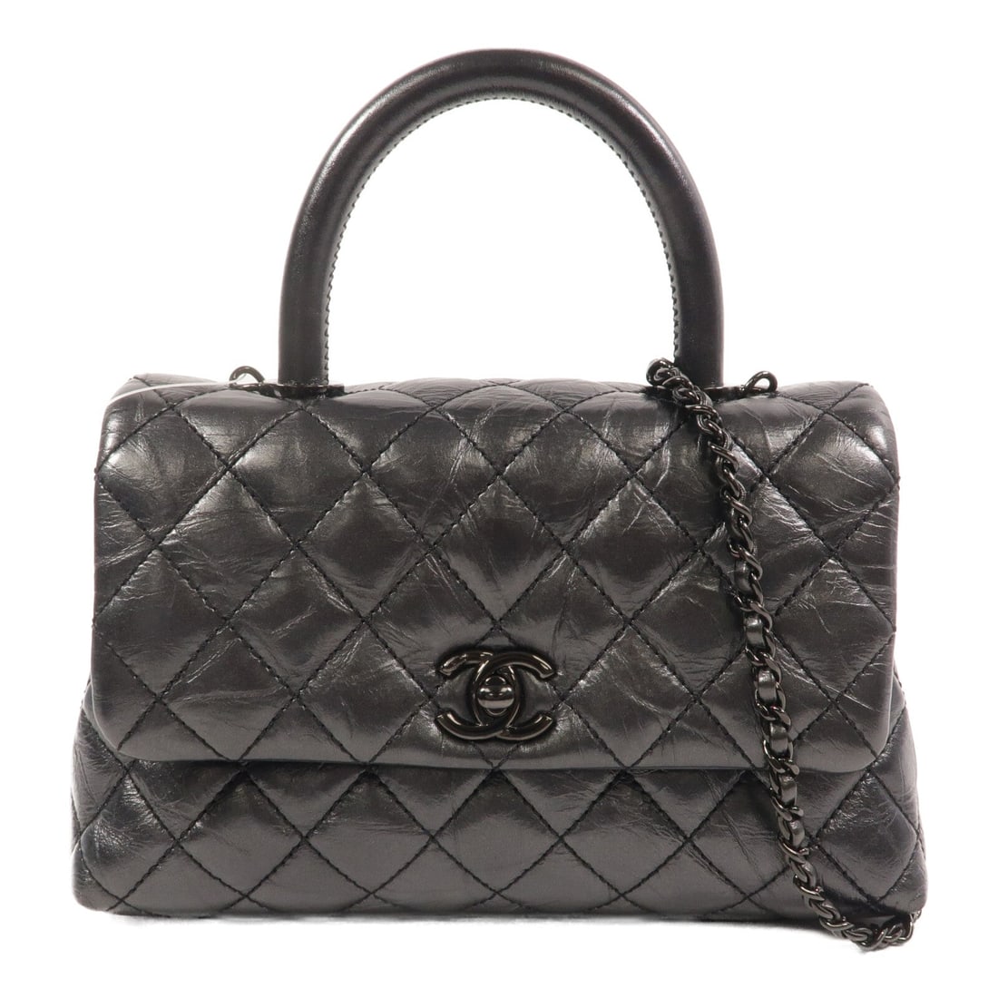 Chanel Coco Handle Small Black: Coco Handle Small 2 way chain shoulder bag in black calfskin with gold hardware; includes storage bags, hologram sticker, guarantee, and shoulder strap; 23 x 13 x 9 cm.
