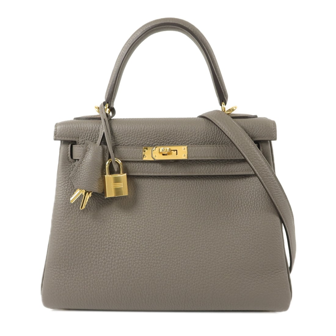 Hermes Kelly 25 Etain: Kelly 25 2 way shoulder bag in Etain Togo leather with gold hardware; includes box, storage bags, shoulder strap, clochette, key, and cadena; 25 x 20 x 9.5 cm.