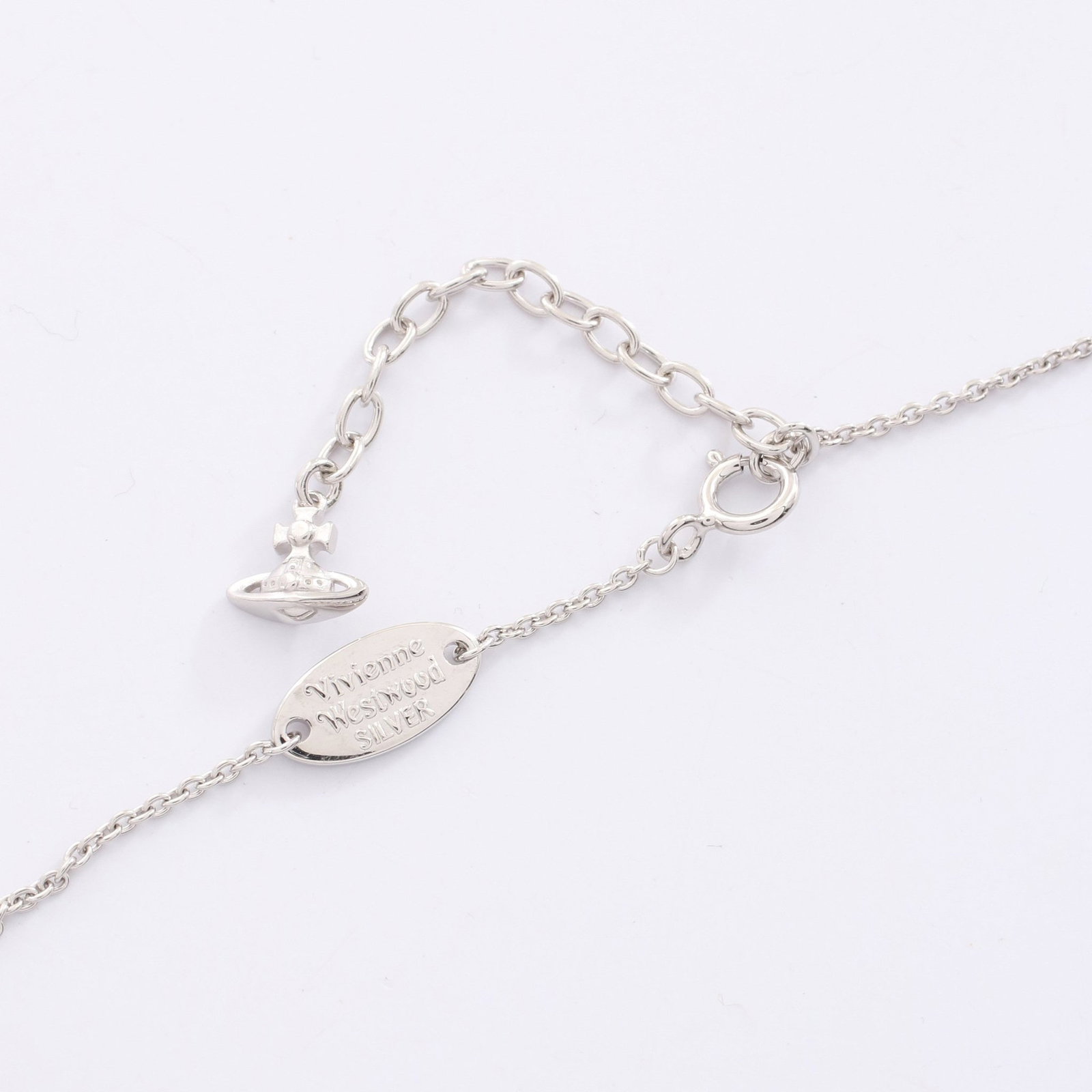 Vivienne Orb 925 Silver Necklace: Orb necklace in SV925 silver with clear rhinestones.