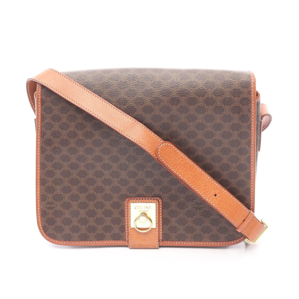 Celine Macadam Shoulder Brown: Celine Macadam Shoulder Bag. Color: Dark Brown Light Brown. Material: Pvc Leather. Size: 26 X 21 X 8.5 Cm. Strap: 115-125 Cm.