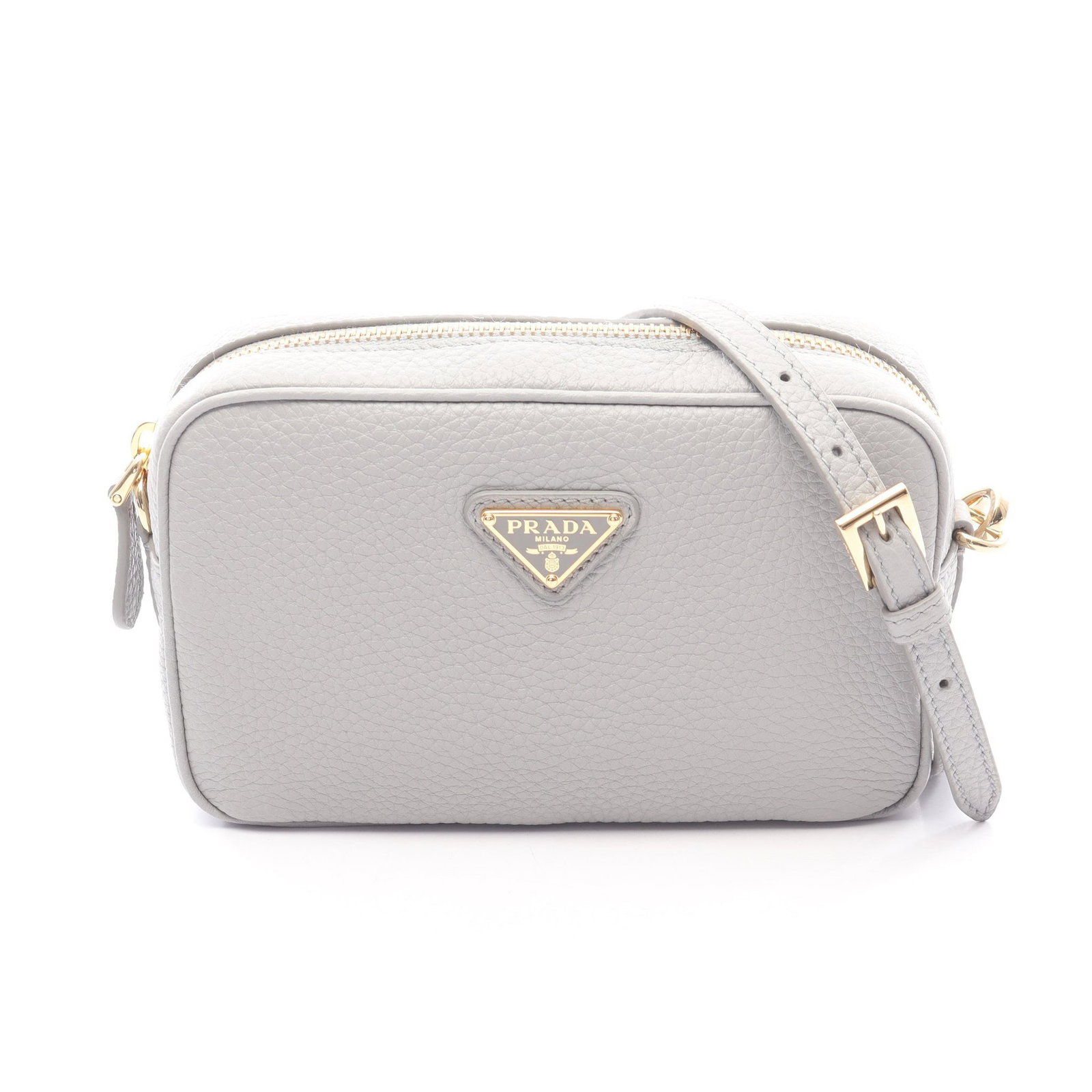 Prada Leather Shoulder Bag Gray: Authentic and authenticated Prada shoulder bag in gray leather. Model 1NF060. Approx. 10.5H x 17W x 5D cm with 118-134 cm strap. Includes box and shoulder strap.