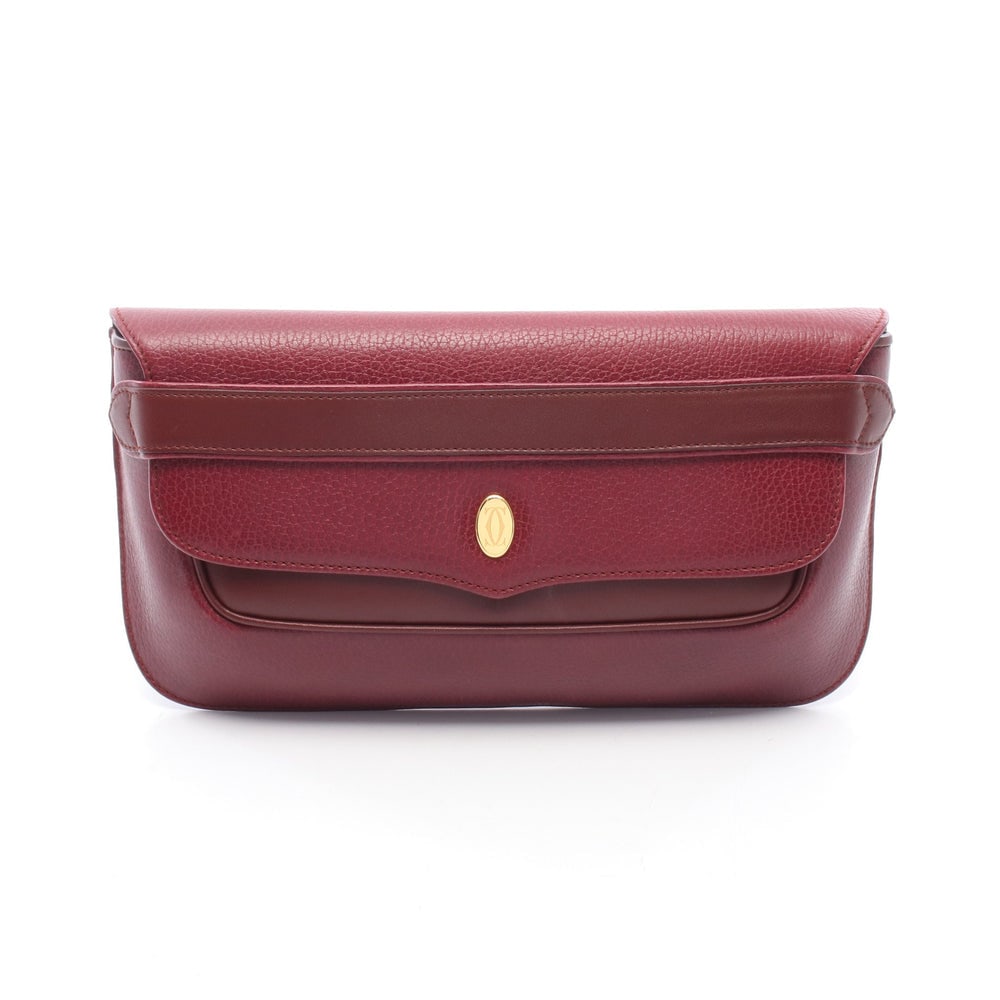 Cartier Must Line Clutch Bordeaux: Must line clutch in bordeaux leather. Size 27.5 x 16 x 4 cm.
