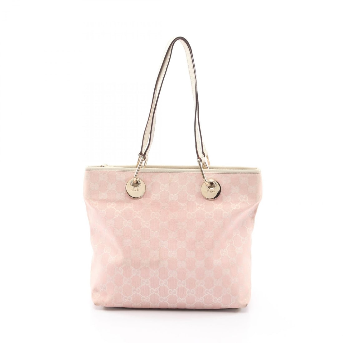 Gucci GG Canvas Pink White Tote Bag: Authentic and authenticated Gucci GG canvas tote handbag in pink/white canvas and leather. Model 139552. Approx. 24H x 31/26W x 11D cm with 52 cm handle. No accessories listed.
