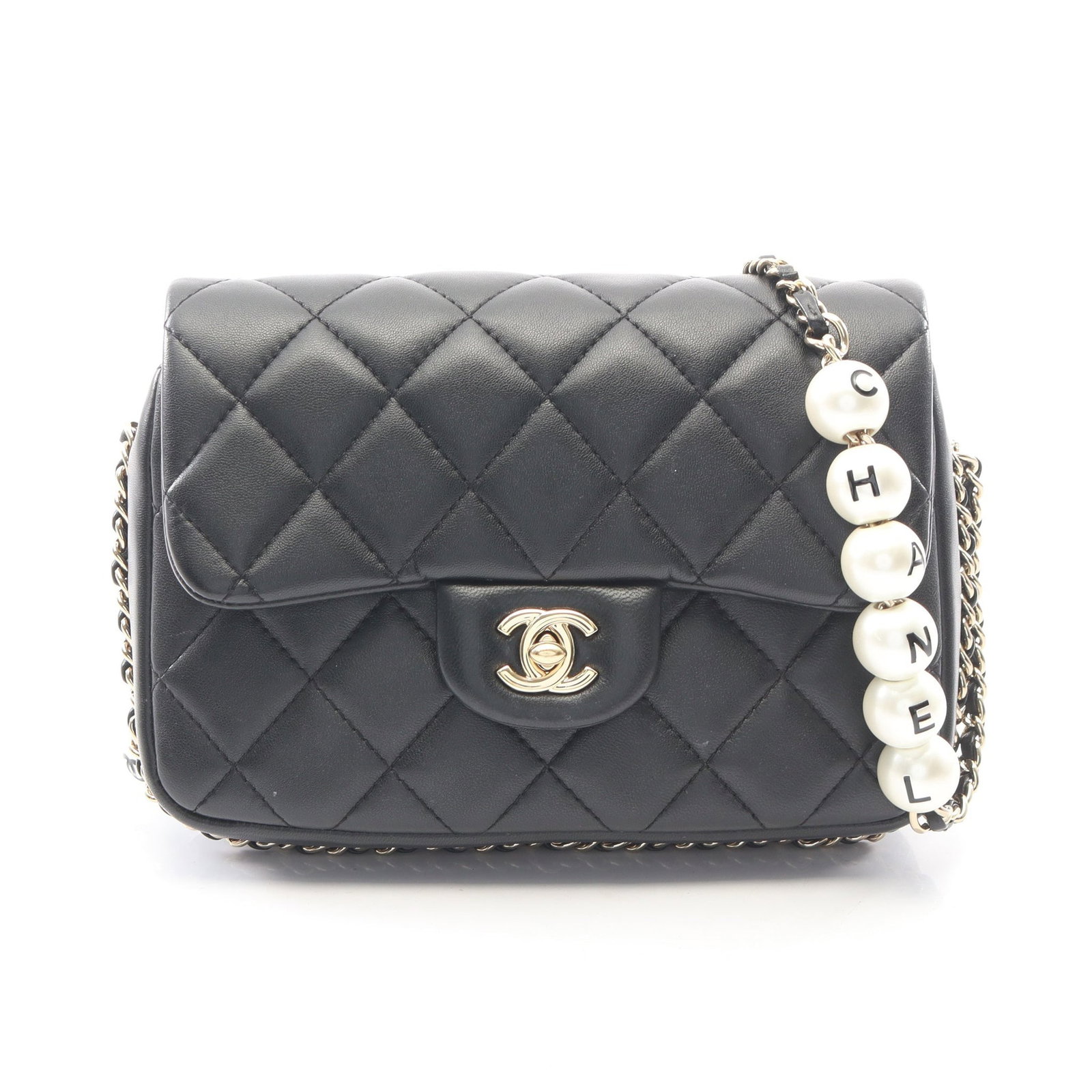 Chanel Small Flap Bag Black: Black lambskin small flap chain shoulder bag with gold-tone hardware.