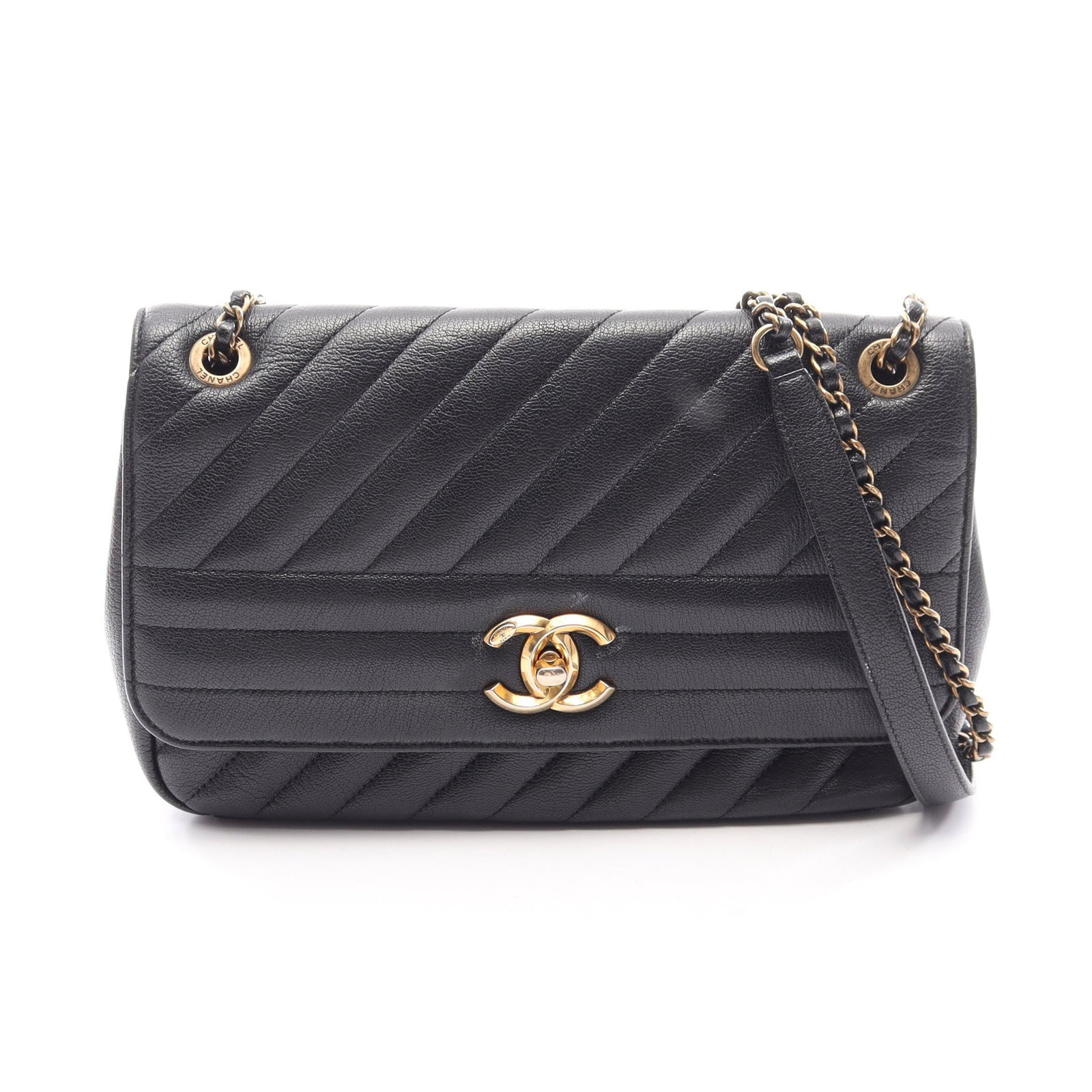 Chanel Quilted Flap Bag Black: Black leather Coco Mark quilting flap bag with chain strap and gold-tone hardware.
